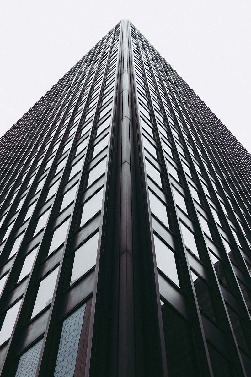high rise low-angle photography of building town